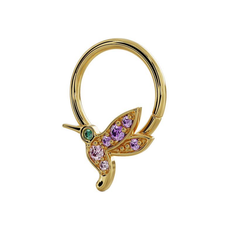 Close-up angled view of 14K yellow gold hummingbird seam ring showing gemstone setting detail