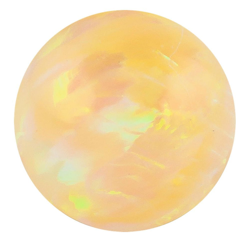 Yellow synthetic opal replacement ball for 14k gold barbell with warm peachy iridescent glow