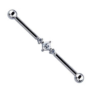 14K white gold industrial barbell with triple CZ setting — princess cut center flanked by two round stones