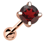 14k rose gold 5mm genuine garnet cartilage stud with deep red stone, angled product view