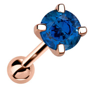 14k rose gold 5mm genuine sapphire cartilage stud with deep blue stone, angled view