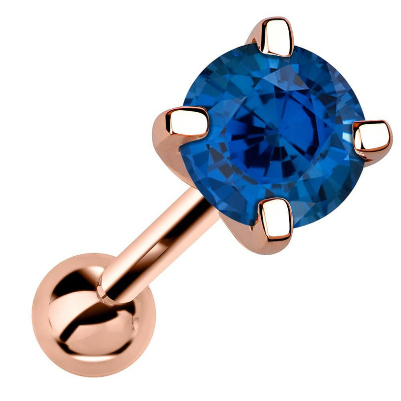 14k rose gold 5mm genuine sapphire cartilage stud with deep blue stone, angled view