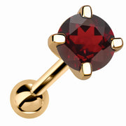 14k yellow gold 5mm genuine garnet cartilage stud with four-prong setting, angled view
