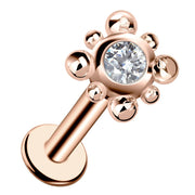 14k rose gold beaded bezel-set diamond flat back labret stud, angled view showing warm tone finish