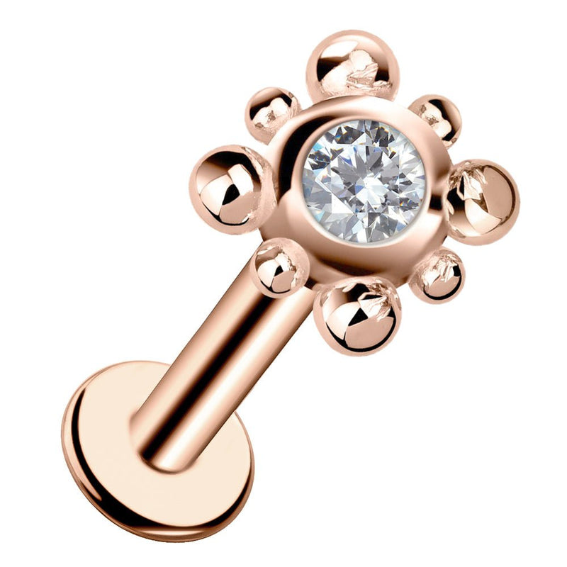 14k rose gold beaded bezel-set diamond flat back labret stud, angled view showing warm tone finish