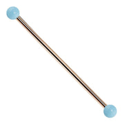 14K rose gold industrial barbell with simulated turquoise ball ends, 14G warm-toned straight barbell