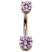 14k rose gold double CZ belly ring with soft pink stones complementing the warm rose gold tone