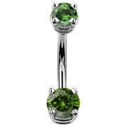 14k white gold double belly ring with rich dark green CZ stones in claw settings, front view