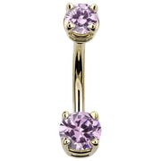 14k yellow gold navel ring with two soft pink round CZ stones in claw prong settings, front view