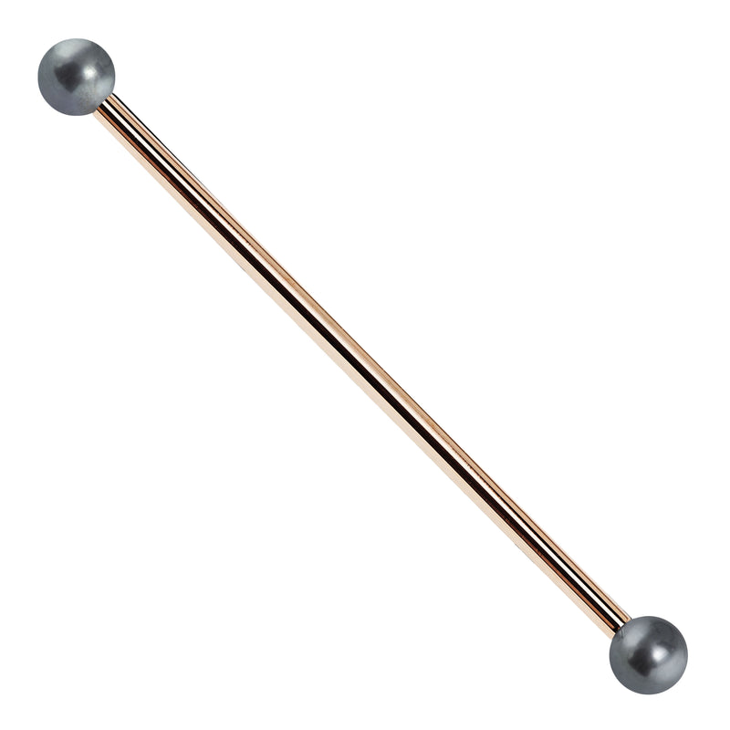 14K rose gold industrial barbell with cultured peacock pearl ends, front view