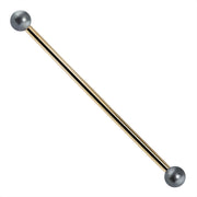 14K yellow gold industrial barbell with dual cultured peacock pearl ends, front view