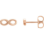 14K rose gold infinity stud earrings angled to show slim profile and butterfly push-back clasp