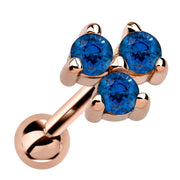 14k rose gold triple sapphire cartilage earring with vivid blue stones in triangle cluster, angled view