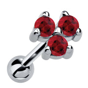 14k white gold triple ruby cartilage stud with three bold red stones in triangle cluster setting, angled view