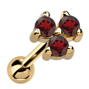 14k yellow gold triple garnet cartilage stud with deep red stones in triangle cluster setting, angled view