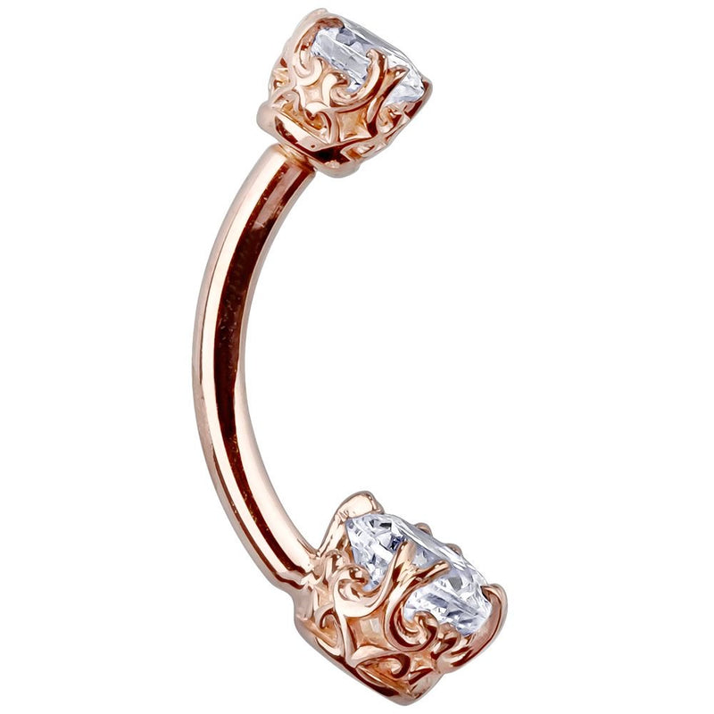14k rose gold belly ring with CZ in engraved filigree settings, side profile showing curved barbell