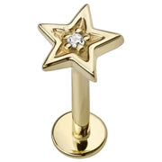 14k yellow gold star flat back labret stud with center diamond, angled view showing post and disc