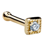14K yellow gold square CZ nose bone stud, angled view showing ball end and beaded bezel setting
