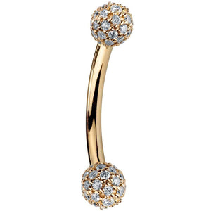 14K yellow gold curved barbell with diamond pavé 4mm balls, side view showing warm gold tone