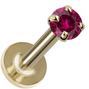14K yellow gold flat back labret with 3mm rhodolite garnet in four-prong setting, angled product view
