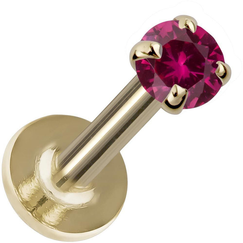 14K yellow gold flat back labret with 3mm rhodolite garnet in four-prong setting, angled product view