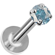 2mm blue zircon flat back labret in 14K white gold, angled view showing flat disc backing