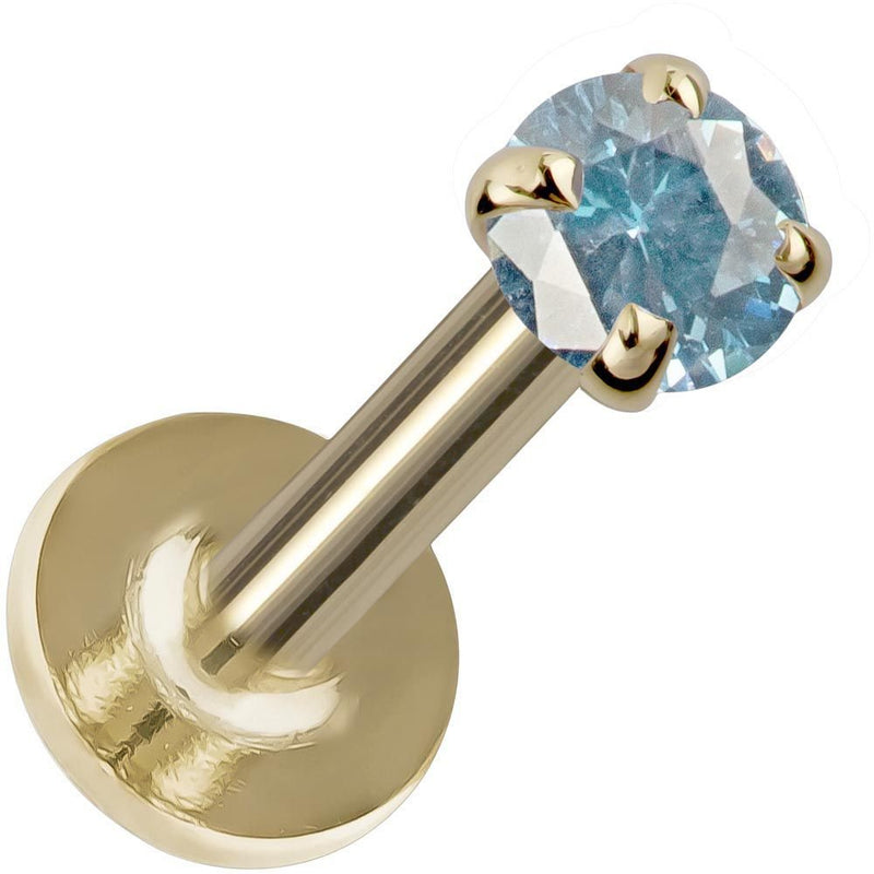 2mm blue zircon flat back labret in 14K yellow gold, angled view highlighting prong setting detail