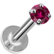 14K white gold flat back labret with 3mm rhodolite garnet in four-prong setting, angled view