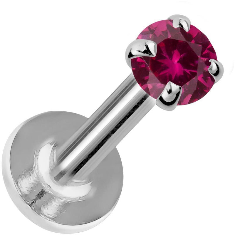 14K white gold flat back labret with 3mm rhodolite garnet in four-prong setting, angled view