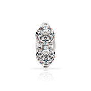 Macro close-up of two prong-set round diamonds in 14K white gold nose stud setting, front view