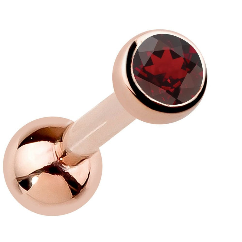 14k rose gold bezel-set garnet cartilage earring with deep red genuine gemstone, angled view