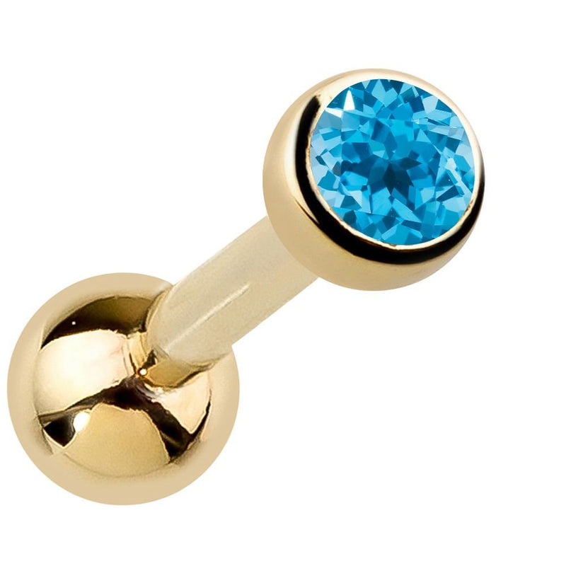 14k yellow gold bezel-set blue topaz cartilage stud with bright electric blue gemstone, angled view