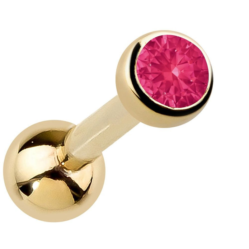 14k yellow gold bezel-set ruby cartilage earring with vivid pink-red genuine gemstone, angled view