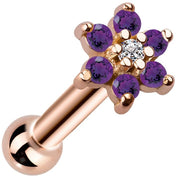 14k rose gold flower cluster cartilage stud with purple CZ petals and clear center stone, angled view