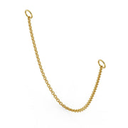 Angled side view of 14k yellow gold link chain piercing connector showing drape and ring ends