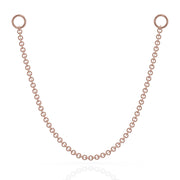 14k rose gold link chain piercing connector with two ring ends, front view on white