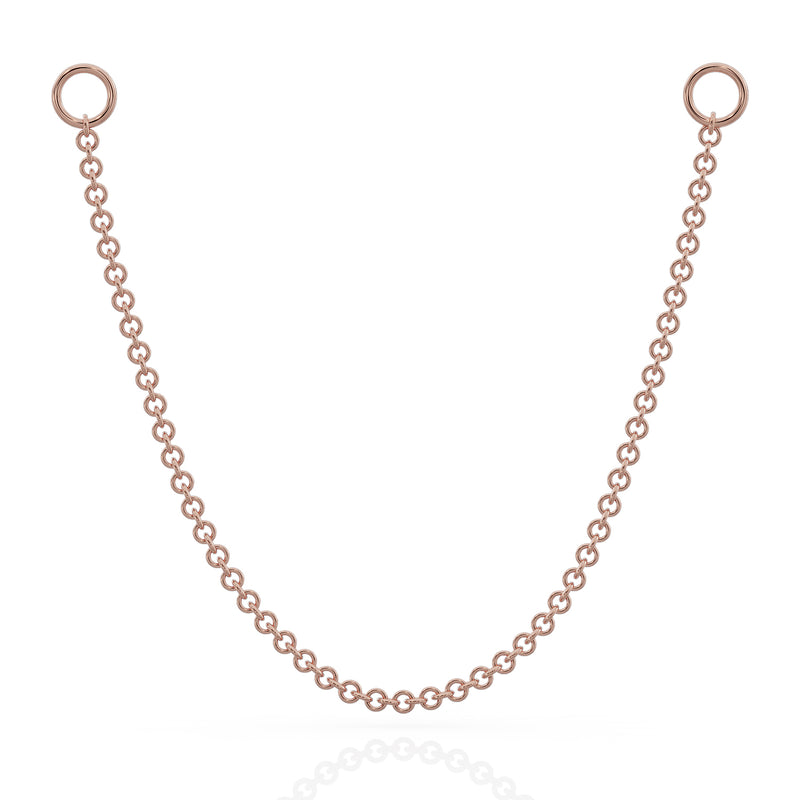 14k rose gold link chain piercing connector with two ring ends, front view on white