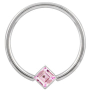 14k white gold fixed bead ring with pink princess-cut CZ corner-mount bezel, front view