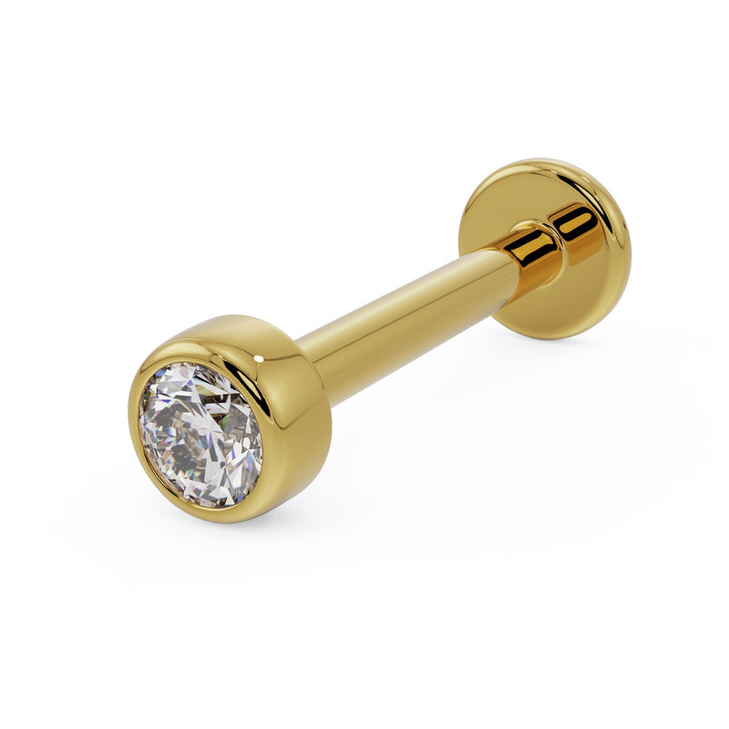 14k yellow gold 2mm diamond bezel flat back labret, angled front view on white background