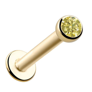 14k yellow gold flat back labret with 2mm bezel-set canary yellow diamond, angled product view
