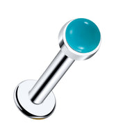 14k white gold flat back labret with 2mm turquoise cabochon bezel stud, angled view on white background