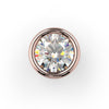 Top-down close-up of round diamond in 14K rose gold bezel setting highlighting stone brilliance and rosy gold surround