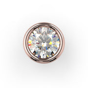 Top-down close-up of round diamond in 14K rose gold bezel setting highlighting stone brilliance and rosy gold surround
