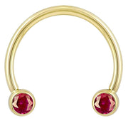 14k yellow gold circular barbell with red CZ bezel ends, smaller diameter front view