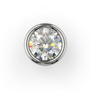 Top-down close-up of round VS1 diamond in 14K white gold bezel setting showing full sparkle and facets