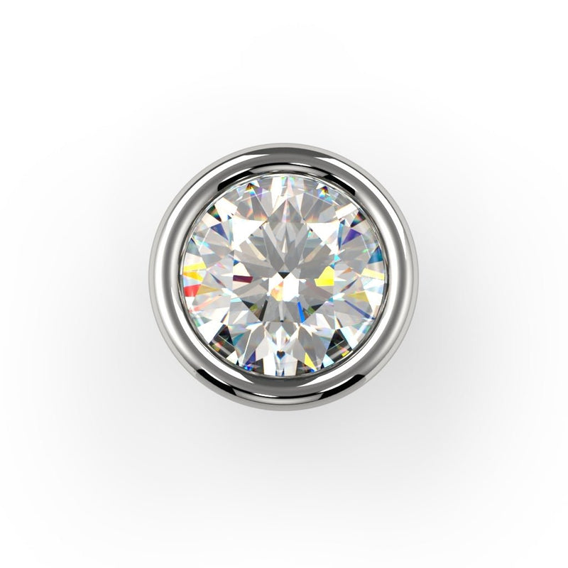 Top-down close-up of round VS1 diamond in 14K white gold bezel setting showing full sparkle and facets