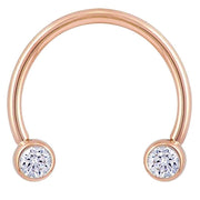 14k rose gold CZ circular barbell with dual bezel ends, 16G front view showing warm pink-gold tone