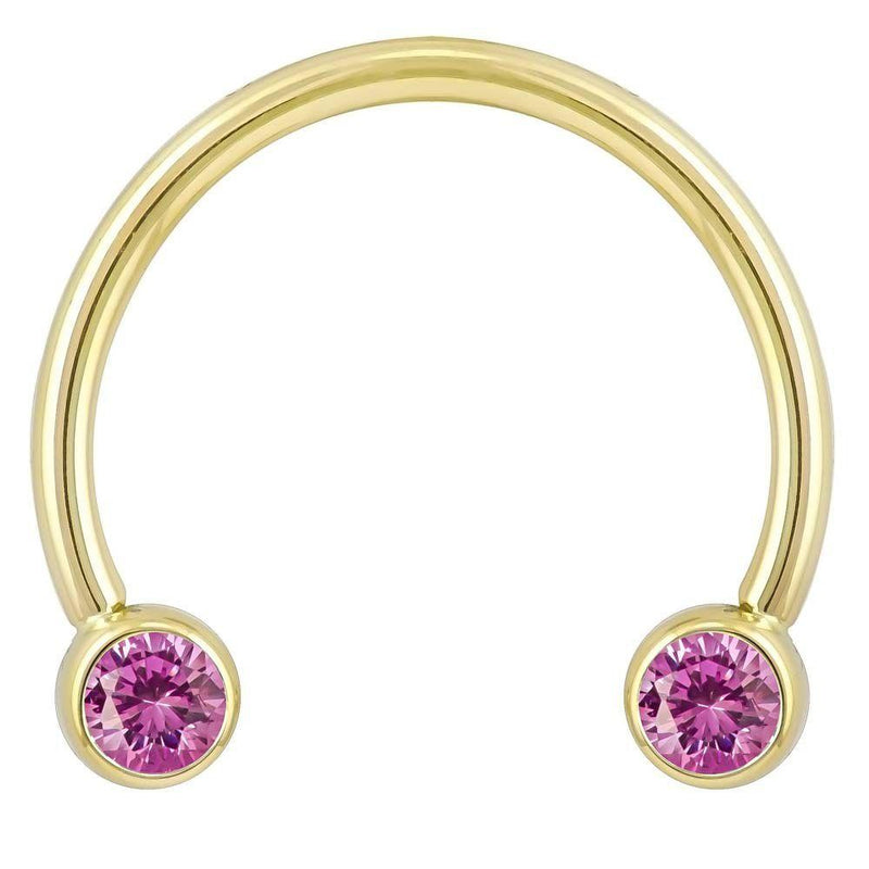14k yellow gold circular barbell with pink CZ bezel ends, smaller diameter front view