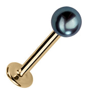 4mm peacock pearl flat back labret in 14k yellow gold, angled view showing post and disc