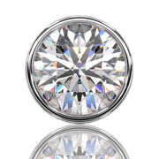 Extreme close-up front view of 4mm round diamond in white gold bezel setting showing full brilliance